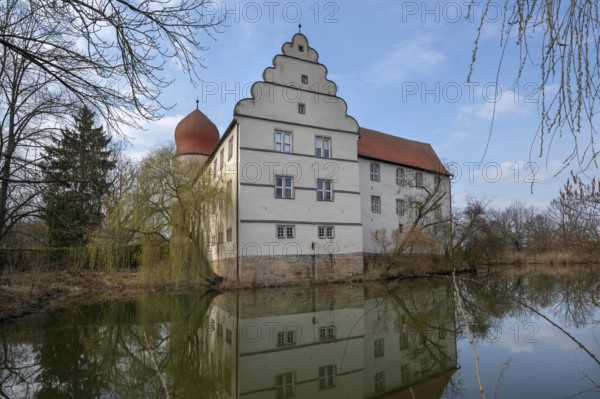 Moated castle, originally a manor house, converted into a Renaissance castle between 1612 and 1618,