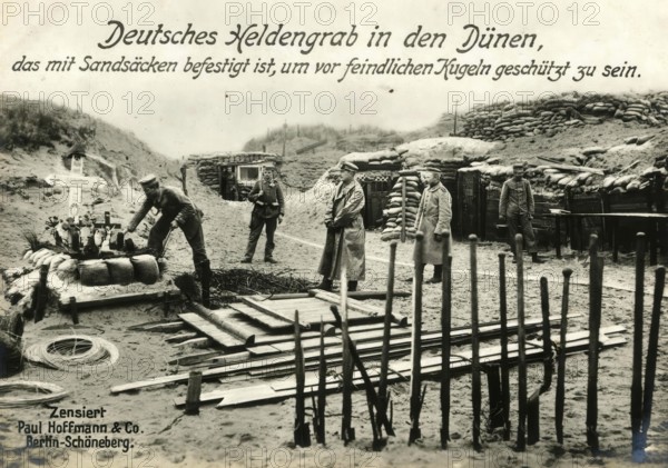 German hero's grave in the dunes, fortified with sandbags to protect it from enemy bullets, 1914 -