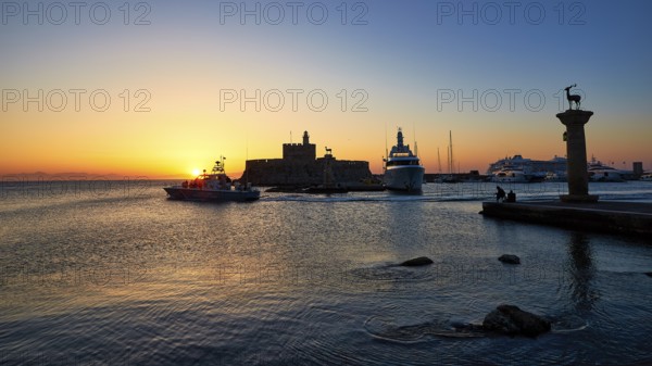 Sunrise in the harbour with boats and an impressive fortress silhouette, Sunrise, Dawn, Fort of