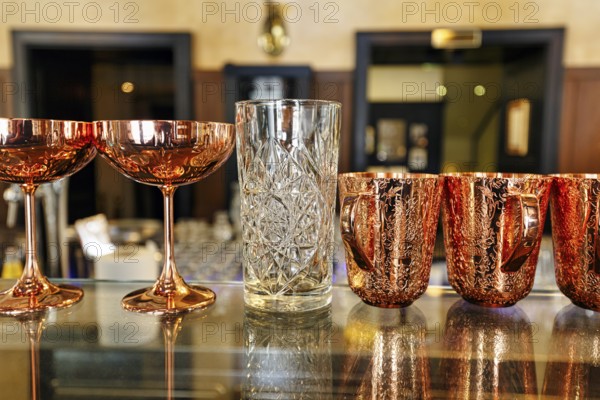 Various decorated glasses on a counter, classic coffee house, Central Grand Café, bar, Budapest,