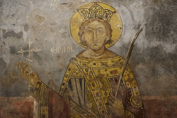 Image of a saint with a golden crown and halo on a church wall, Thari Monastery, Moni Thari, near