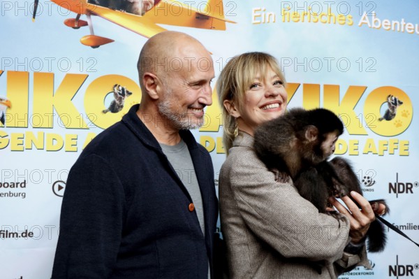 Benno Fürmann and Heike Makatsch at the Berlin premiere of AKIKO - DER FLIEGENDE AFFE at the