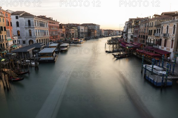 Evening light at sunset, view over the Grand Canal, from the Rialto Bridge, long exposure, Venice,