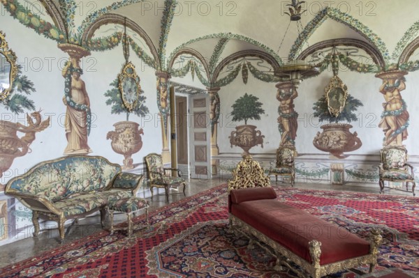 Masino, Italy, April 2023: baroque livingroom in old castle. Vintage interior, original from 18th