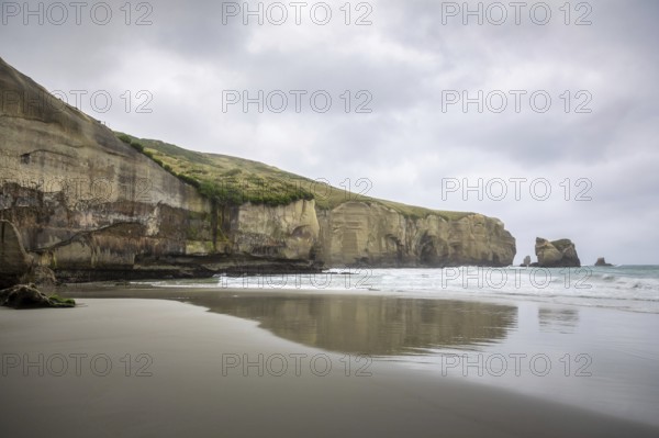 An image of the Tunnel Beach in New Zealand