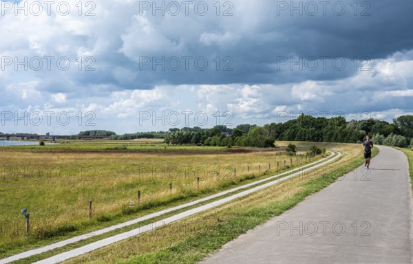 Zwolle, Overijssel, The Netherlands, 07 15 2022, Bicycle path at the dike of the River Ijssel flood
