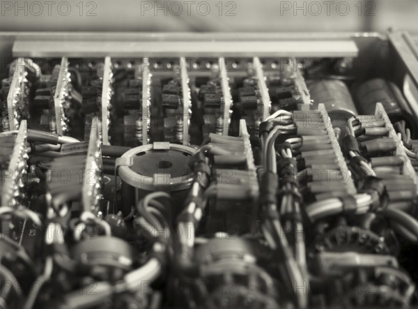 Monochrome selective focus image of complex colored wiring and connectors joining circuit boards