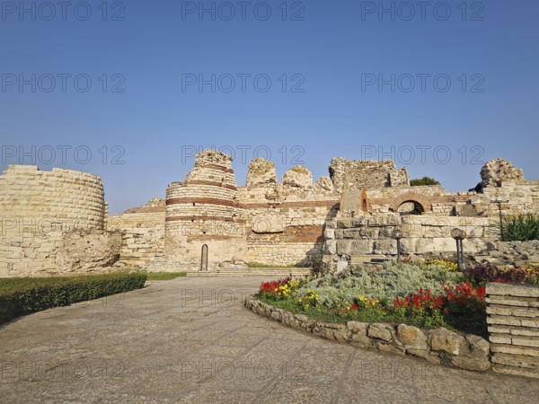 Ancient ruins of Nessebar, weathered brick and stone walls remnants of Byzantine fortress structure