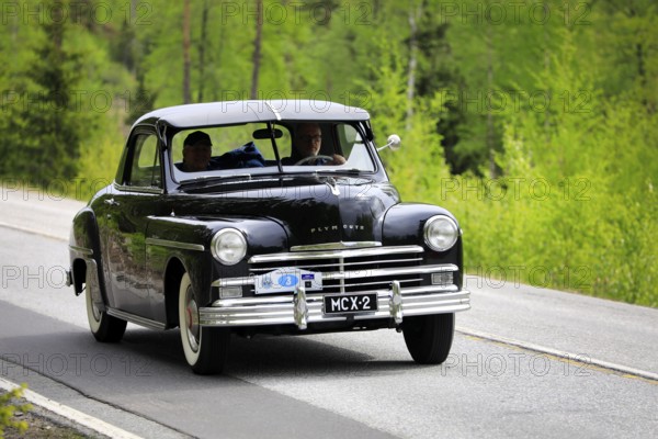 1949 Plymouth P-17 Deluxe Business Coupe on Ascension Day vintage car rally by AHS ry, road 104,