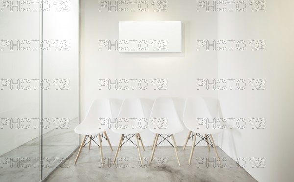 Empty office room, Glass window to the left .Loft interior style, white canvas print on the center