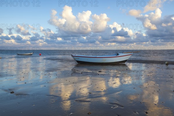 Fishing boats on the empty beach, Hjerting, Jutland, Denmark. Hjerting is a district of Esbjerg in