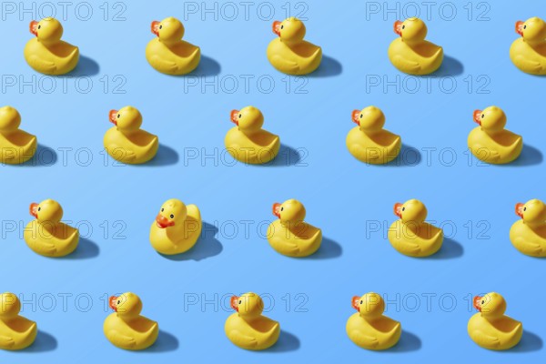 Trendy pop art design of a yellow rubber duck pattern from a top view. Dissenting opinion, chosen