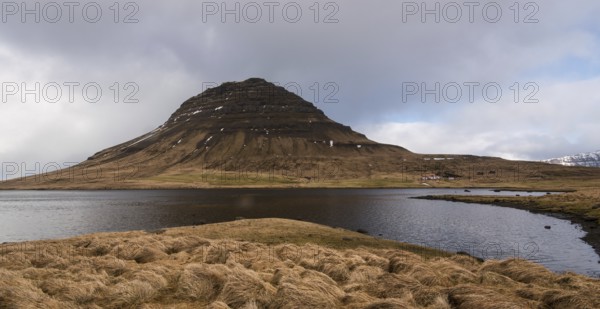 Dramatic Icelandic landscaspe with Kirkjufell mountain, at Grundarfjordur, on the Snaefellsnes