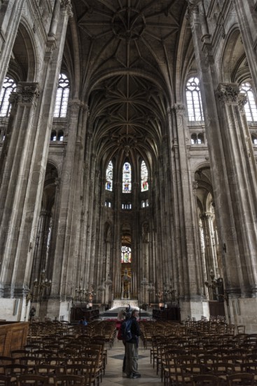 PARIS, FRANCE, MAY 24, 2022, Tall columns and beautifully ornate ceiling in the gothic church Saint