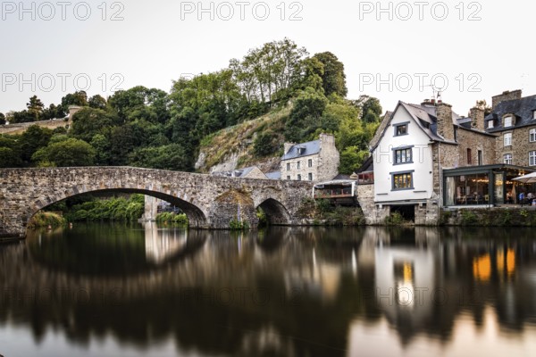View of the medieval vridge over river Rance and the harbour of the city of Dinan, French Brittany.