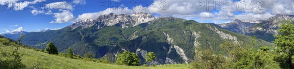 Mountain panorama above Bardonecchia with Pointe Cloutzau and Aiguille Rouge, railway tracks,
