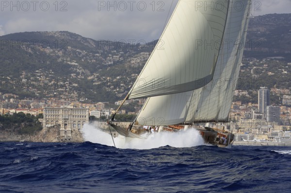 90-year-old sailing yacht Three-masted topsail schooner XARIFA sails during Monaco Classic Week.