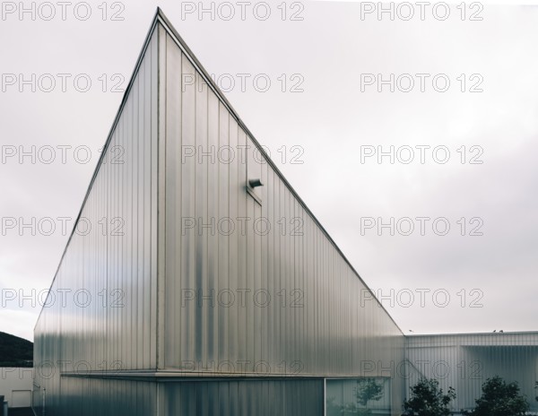 Angra do Heroismo, Portugal, July 1, 2022: New building of modern architecture with U-glass facade