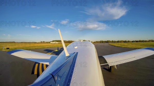 A small general aviation aircraft, its pre-takeoff checklist complete, taxis carefully to the