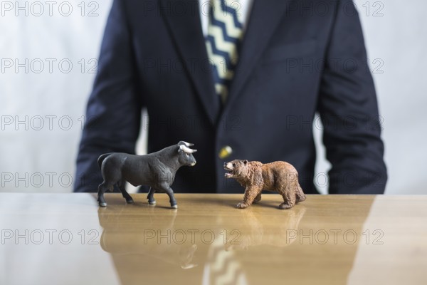 Stock market, securities trading and capitalism concept with a bull and bear concepts. Business