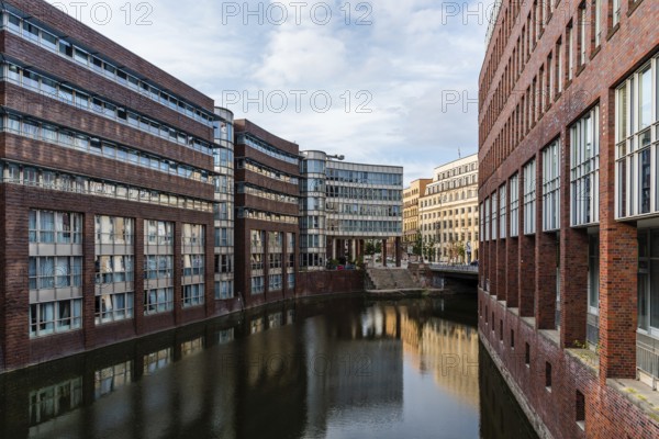 Hamburg, Germany, August 4, 2019: Scenic view of Bleichenfleet Canal in Hamburg view at sunset,