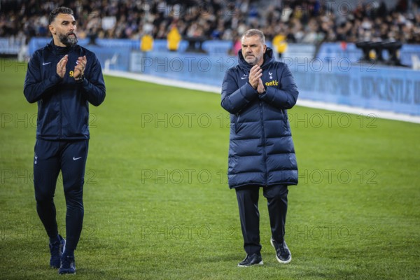 MELBOURNE, AUSTRALIA, MAY 22: Mile Jedinak and Ange Postecoglou of Tottenham Hotspur after losing