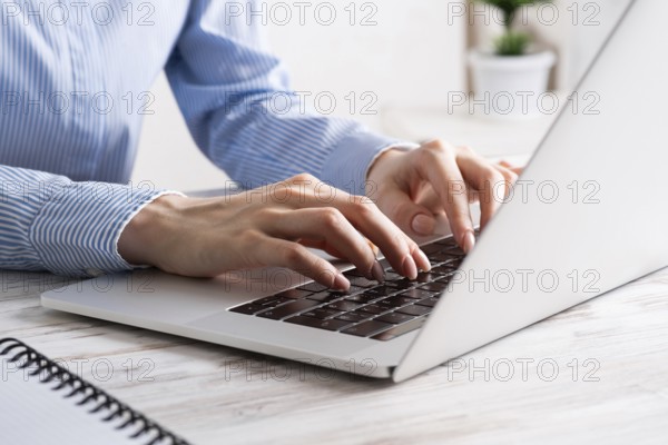 Office manager working with laptop. Corporate office workplace with computer. Business occupation