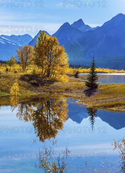 Sunny autumn day in the Rocky Mountains of Canada. The concept of ecological and active tourism.