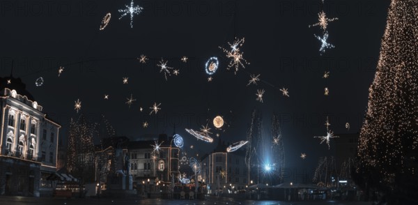 Panorama with the city center of Ljubljana, capital of Slovenia, decorated with Christmas lights,