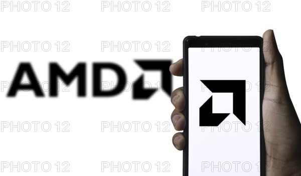 AMD logo displayed on smartphone screen. Advanced Micro Devices, Inc. is an American multinational