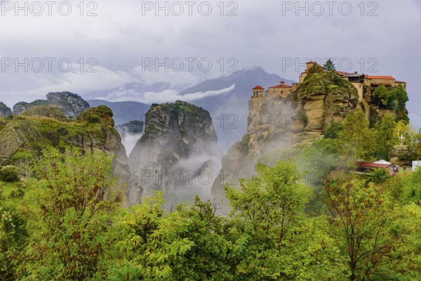Monastery of Varlaam in the fog, the second largest Eastern Orthodox monastery in Meteora, Greece,