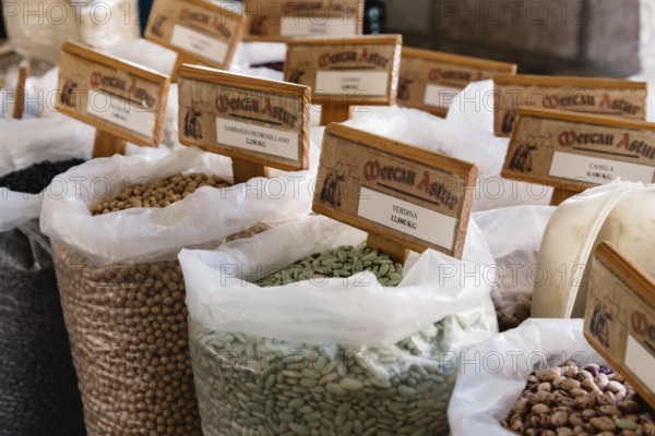 Cangas de Onis, Spain, March 31, 2019: Assortment of beans and other legumes in sacks in food