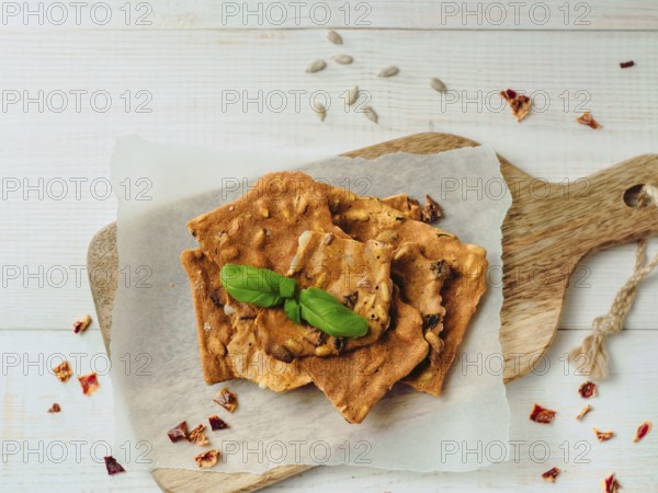 Gluten-freen crispbreads made of buskwheat flour. Green buckwheat flour smoked paprika sunflower