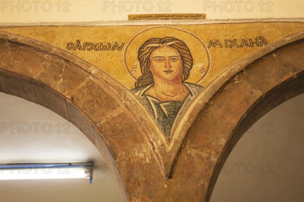 Madaba, Jordan, November 5, 2022: Interior walls of Greek Orthodox church of St George, known by