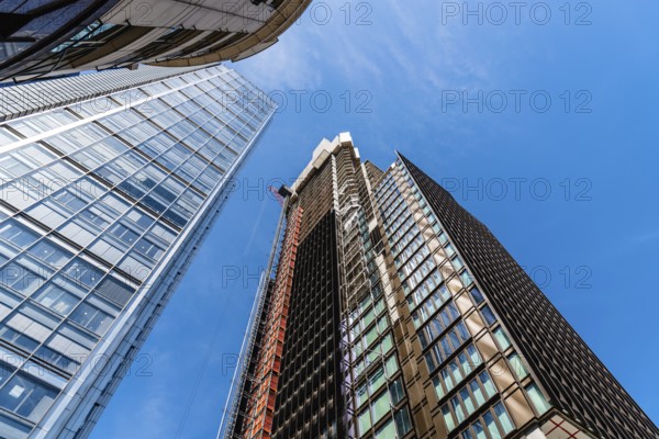London, UK, May 14, 2019: Low angle view of office buildings under construction in the City of