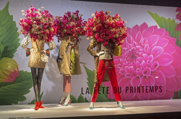 PARIS, FRANCE, MARCH 27, 2017: Mannequins in the showcase of the Printemps department store in