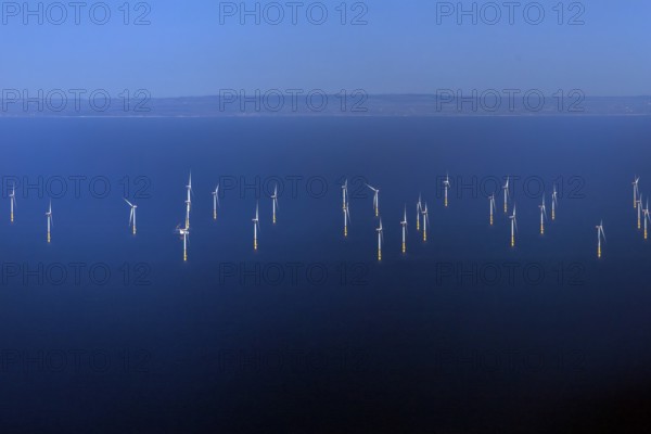 View from Hiddensee to the Baltic 2 offshore wind farm, with the Danish coast in the background,