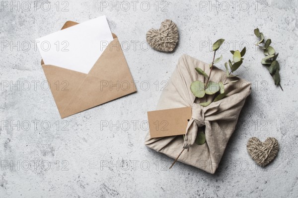 Zero waste Valentine's Day concept and mock up. Eco-friendly gift cloth wrapping in Furoshiki
