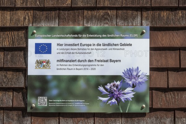 Wooden shingle wall with information sign, agricultural fund, near Niedersonthofen, Allgäu, Swabia,