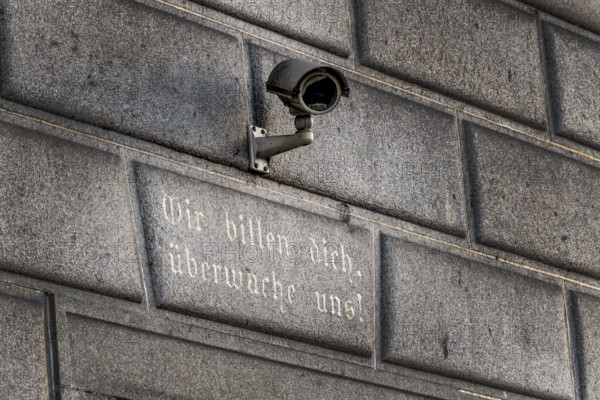 Surveillance camera on a building, symbol for surveillance, internal security, control, data