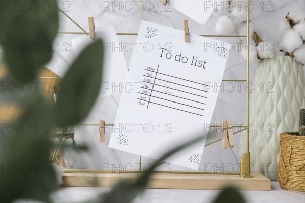 TO DO list Cards and posters mock ups on grid board. Copy space. Home office desktop. Freelance