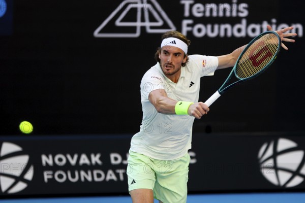 MELBOURNE, AUSTRALIA, JANUARY 11: Stefanos Tsitsipas of Greece plays against Novak Djokovic of