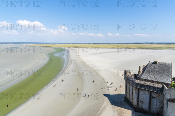Mont Saint Michel, France, July 25, 2018: View of the bay of Mont Saint Michel from the ramparts at