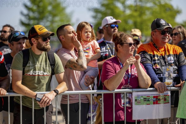 Fans watch all the race action during the Indianapolis 500 at the Indianapolis Motor Speedway in
