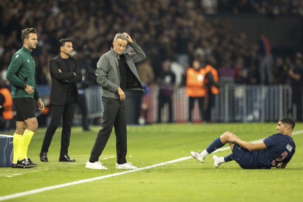 Football match, Achraf HAKIMI Paris Saint Germain right on the ground with pain in his left leg,