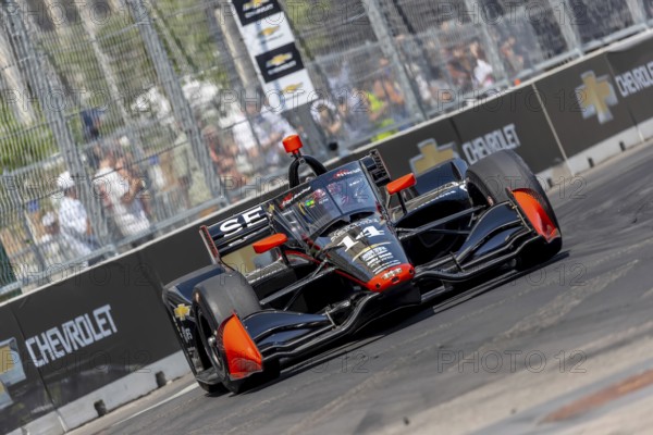 INDYCAR driver, SANTINO FERRUCCI (14) of Woodbury, Connecticut, travels through the turns in his AJ