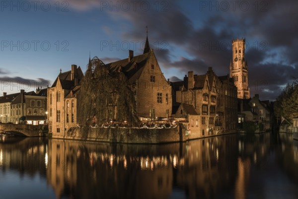 Bruges, West Flemish Region, Belgium, 11 15 2017: The historical Rozenhoedkaai reflecting in the