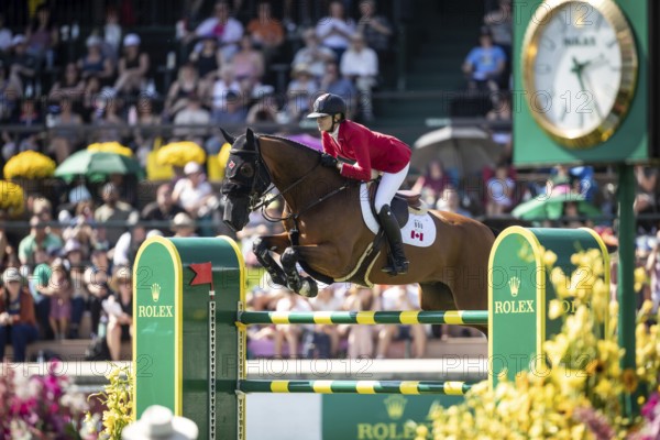 Tiffany Foster of Canada and riding Figor compete in the first round of the 1.60m CPKC