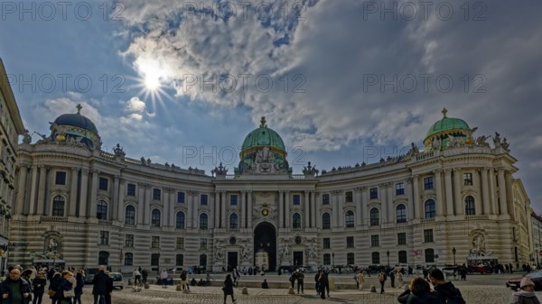 Hofburg Palace in Vienna under a partly cloudy sky and bright sun, Sisi Museum, Vienna, Austria,