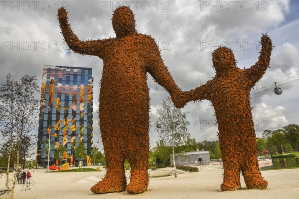 Almere, Netherlands, May 2022. The Arnhem giants and the Flores residential tower at the Floriade